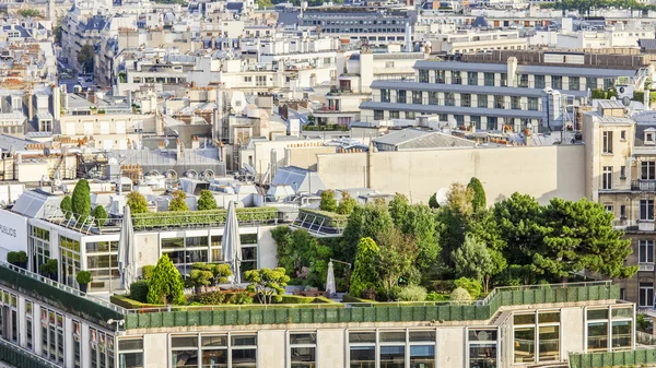 PARIS, FRANCE, on AUGUST 30, 2015. The top view on the city from a survey platform on Arc de Triomphe on the Champs Elysee. Roofs of Paris