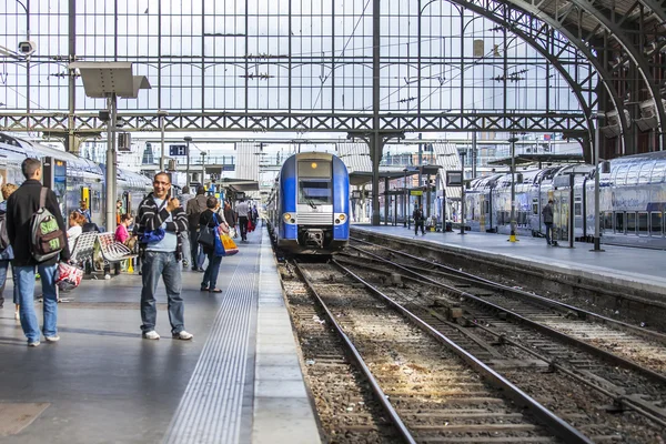 LILLE, FRANCE, on AUGUST 28, 2015. Platforms of the railway station. Trains and passengers.