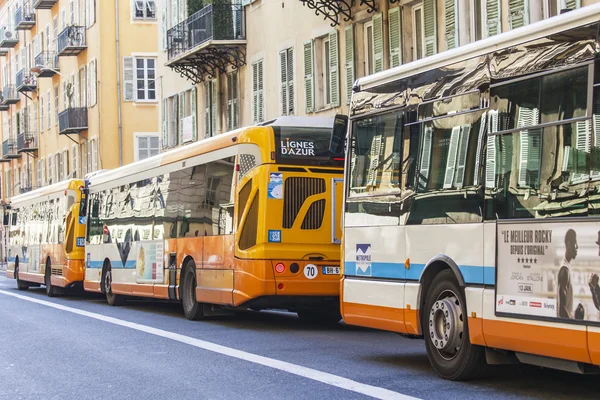 NICE, FRANCE, on JANUARY 7, 2016. City landscape, winter day. Buses stopped near a stop