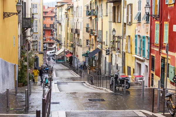 NICE, FRANCE - on JANUARY 11, 2016. Typical urban view. The narrow curve street in the old city