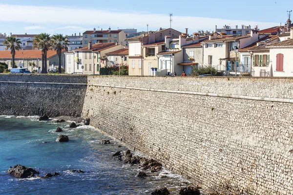 ANTIBES, FRANCE, on JANUARY 11, 2016. City landscape. Houses on the sea embankment. Antibes - one of the cities of French riviera