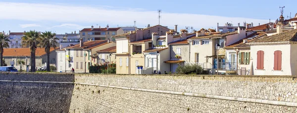 ANTIBES, FRANCE, on JANUARY 11, 2016. City landscape. Houses on the sea embankment. Antibes - one of the cities of French riviera