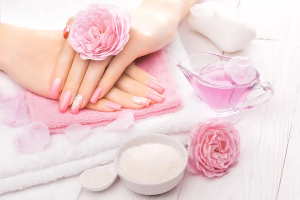 French manicure with essential oils, rose flowers. spa