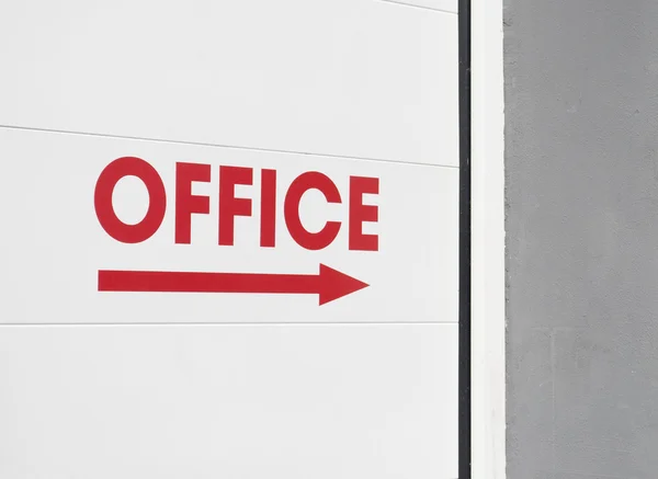 Office sign with arrow