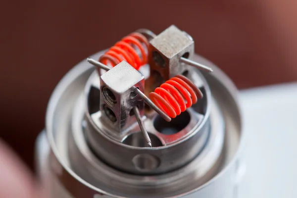 Preheat spiral of clapton coil mounted in the electronic cigarette