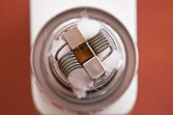 Macro photo of new clapton coil mounted in the electronic cigarette