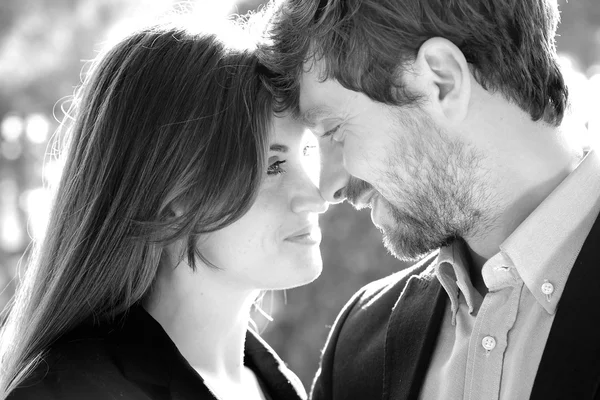 Couple in love looking at each other tenderly