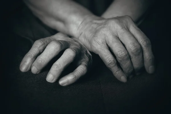 Fingers of the old man's hands