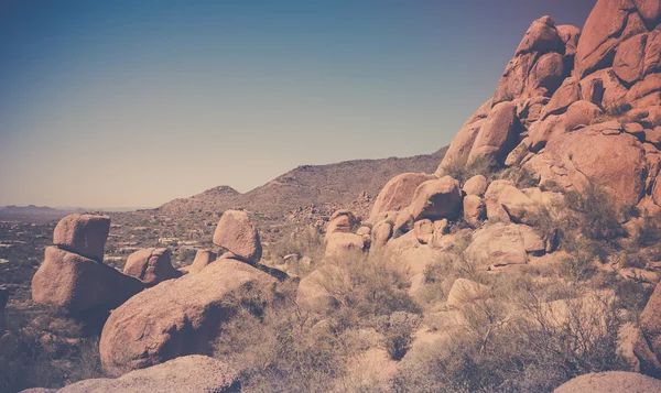 Scottsdale, Arizona, desert red rock buttes landscape.  Image cross processed.