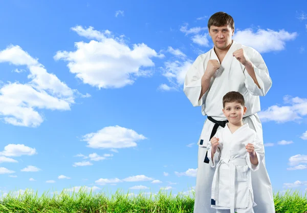 Karate master with young student