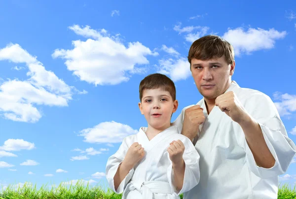 Karate master with young student