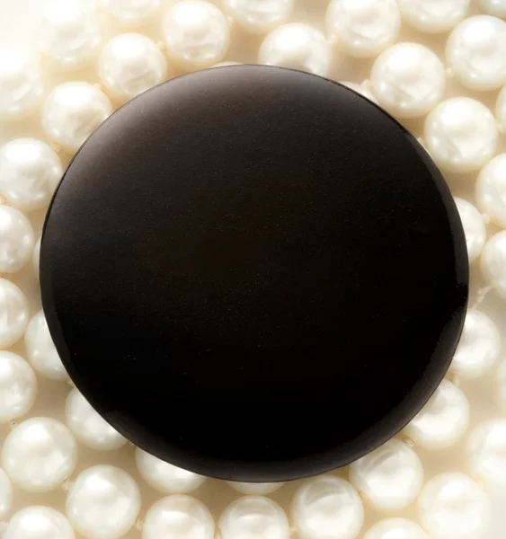 Round badge on pearl