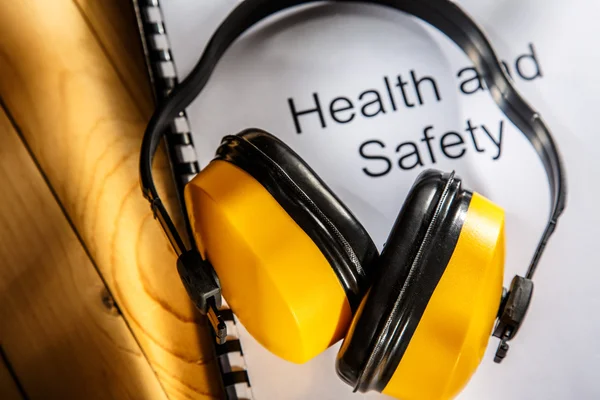Health and safety book with earphones