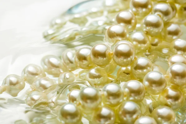 Shining string of white pearls