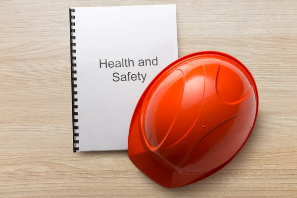 Health and safety register with helmet