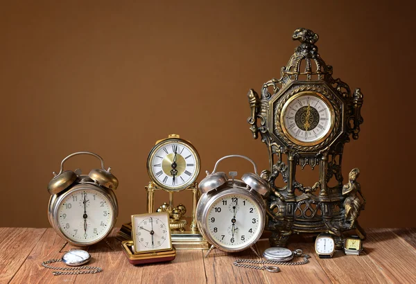 Old clocks, alarm clocks and handheld clocks