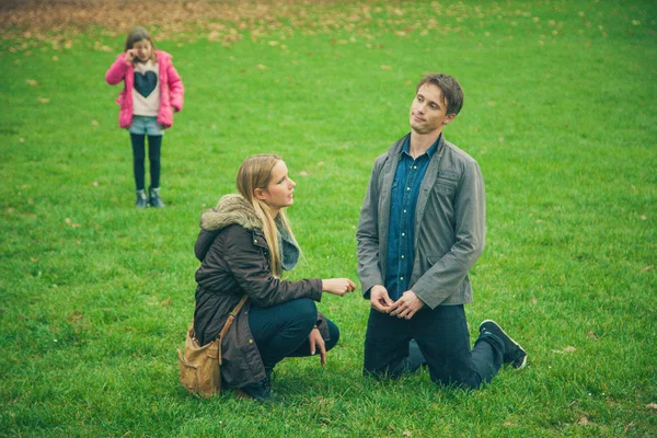 Family of three in park