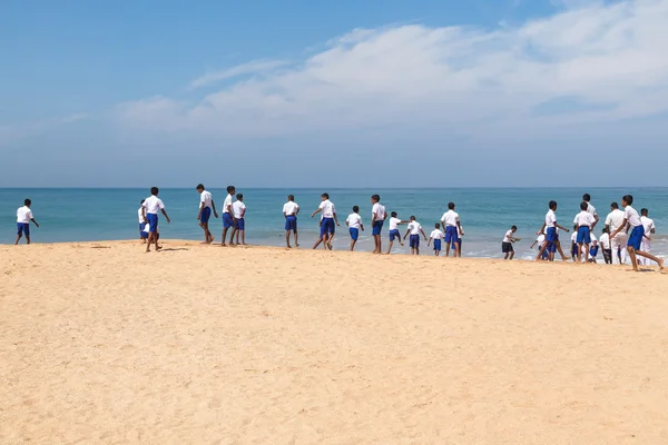Group of school kids at beach at Sea Turtle Farm and Hatchery