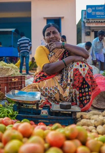Indian lady selling vegetables