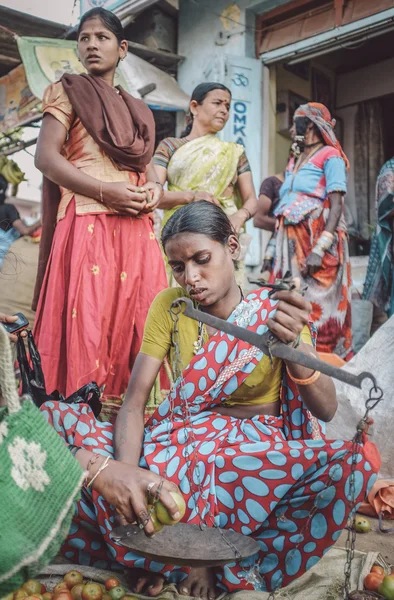 Indian lady sells vegetables