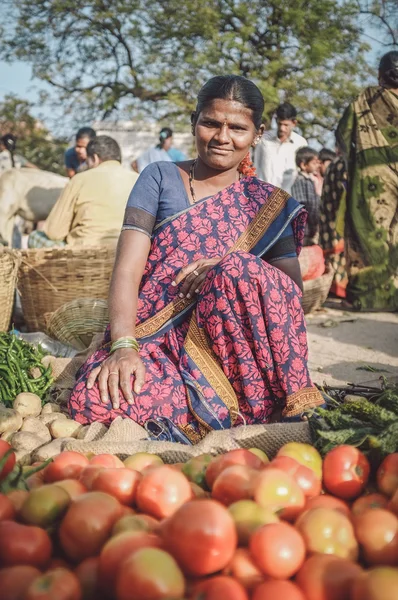 Indian lady sells vegetables