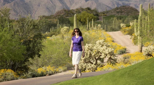 A Woman Walking in the Sonoran Desert