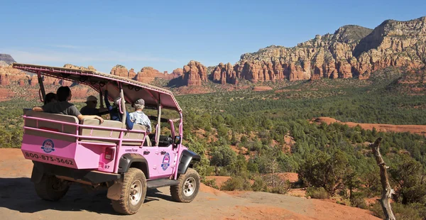 A Pink Jeep Tour Descends Broken Arrow Trail