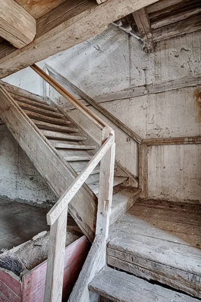 Wooden stairs in an abandoned house