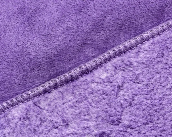 fragment of painted violet  wrong side of sheepskin coat