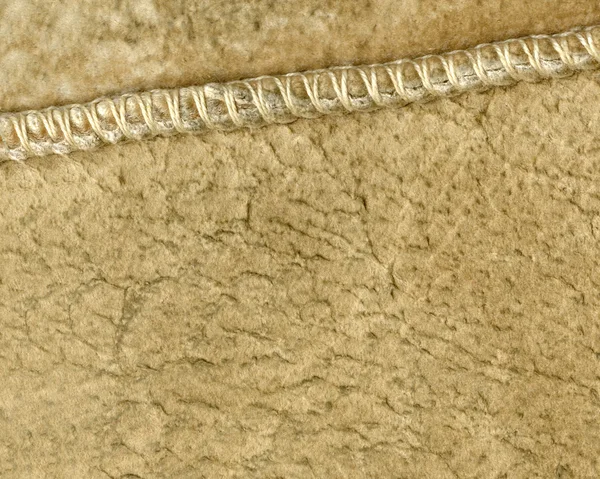 fragment of wrong side of sheepskin as background