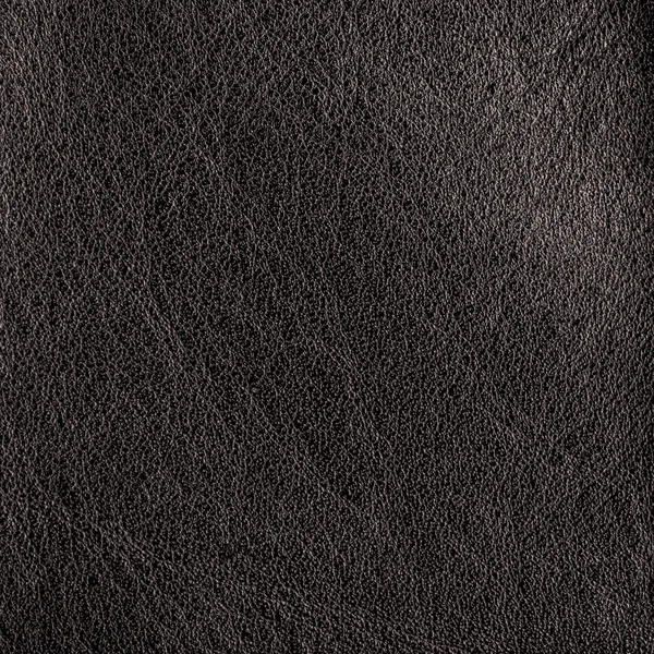 Dark brown leather texture closeup