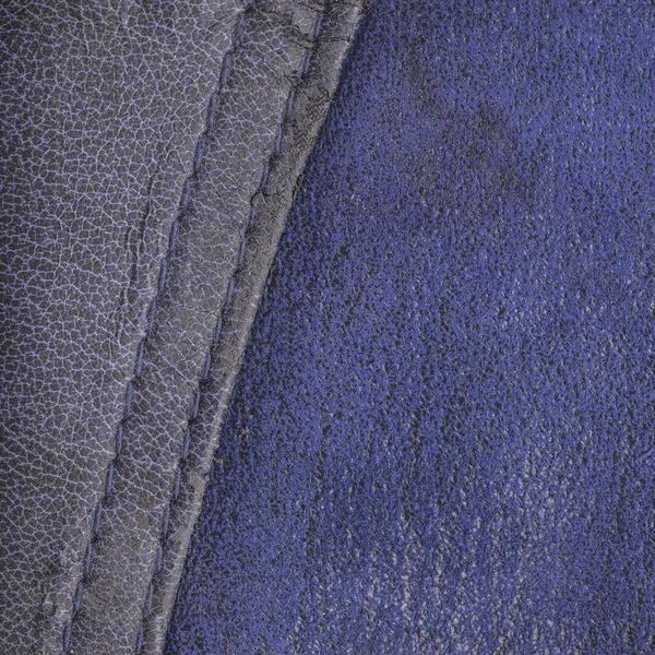 Blue background of two kinds of leather
