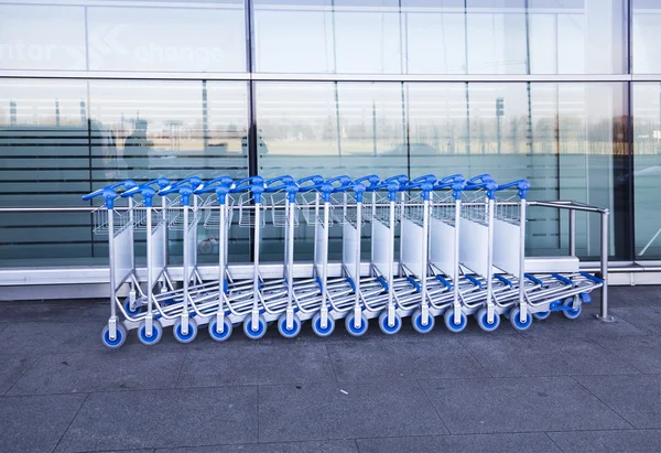 Luggage carts at modern airport