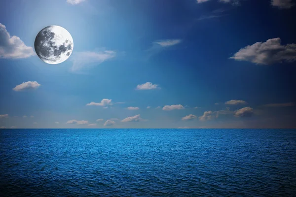 Moon in night sea