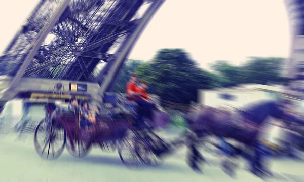 Abstract background. Paris, tourists in carriage with horses nea