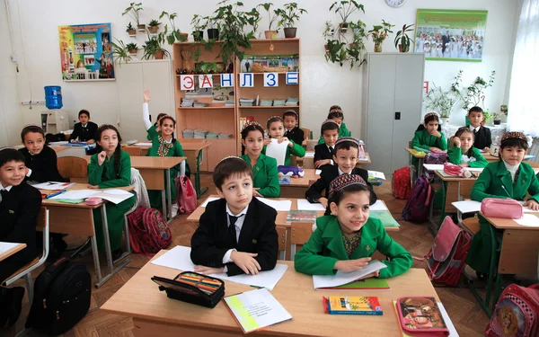 Ashgabad, Turkmenistan - November 4, 2014. Group of students in lesson in the classroom . November 4, 2014.  In schools of Turkmenistan annually trains about 900 thousand children.