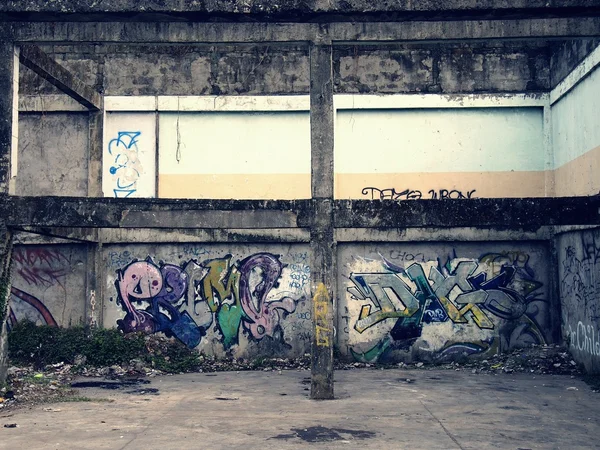 Graffiti art on a wall of an abandoned building structure in Antipolo City, Philippines.