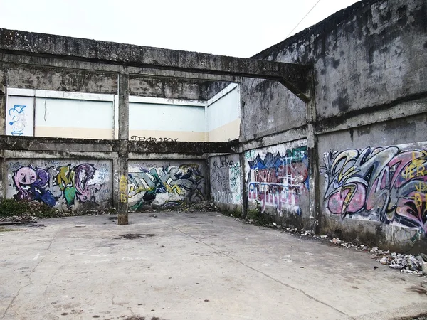 Graffiti art on a wall of an abandoned building structure in Antipolo City, Philippines.