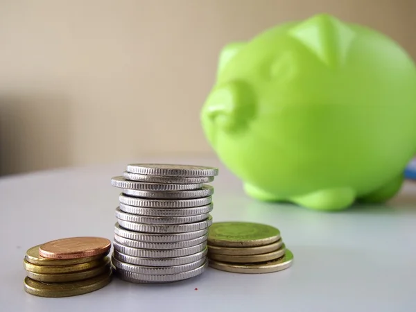 Coins and a coin bank