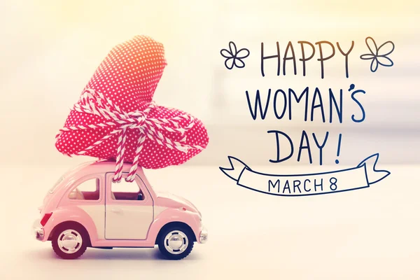Womans Day message with miniature pink