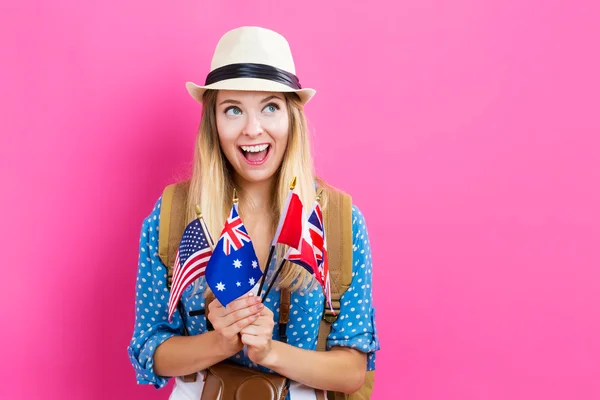 Woman with flags of English speaking countries