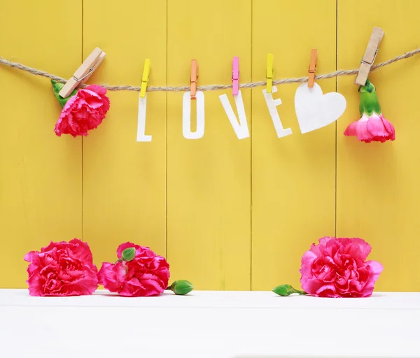 Hanging Love letters with carnation flowers