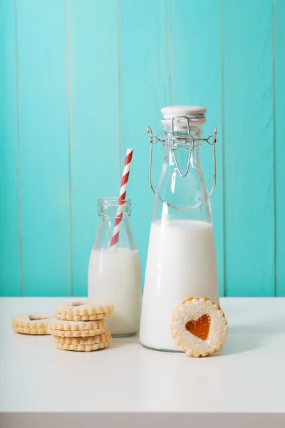 Milk jars with heart shaped cookies
