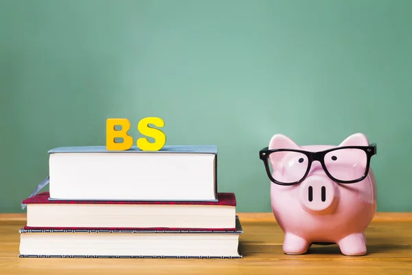 Bachelor of Science degree theme with textbooks and piggy bank