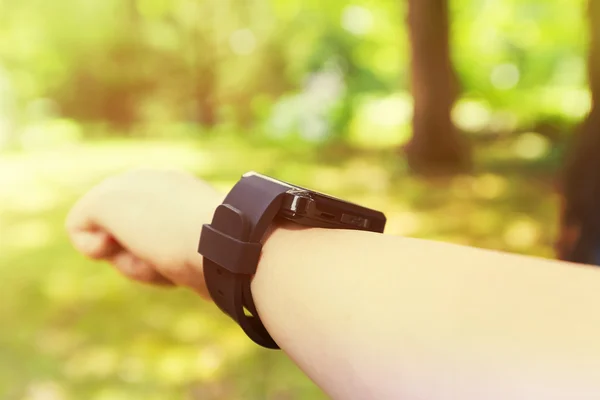 Man looking at his smart watch