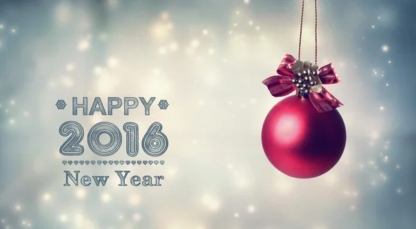 Happy New Year 2016 message with a hanging bauble