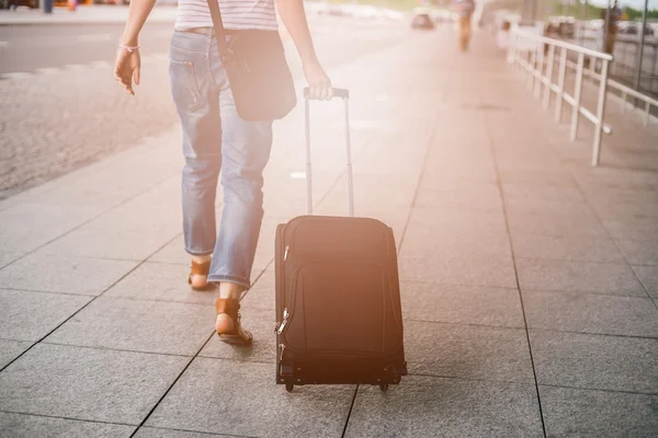 Woman with her luggage