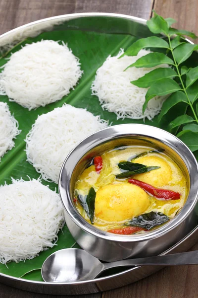 String hoppers with egg curry, south indian cuisine