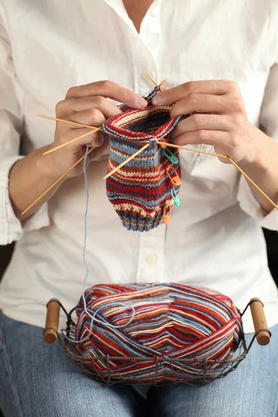 Close up of woman hands knitting