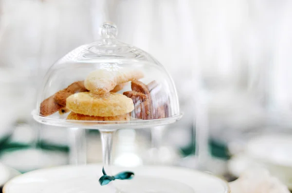 Glass bell jar with cookies